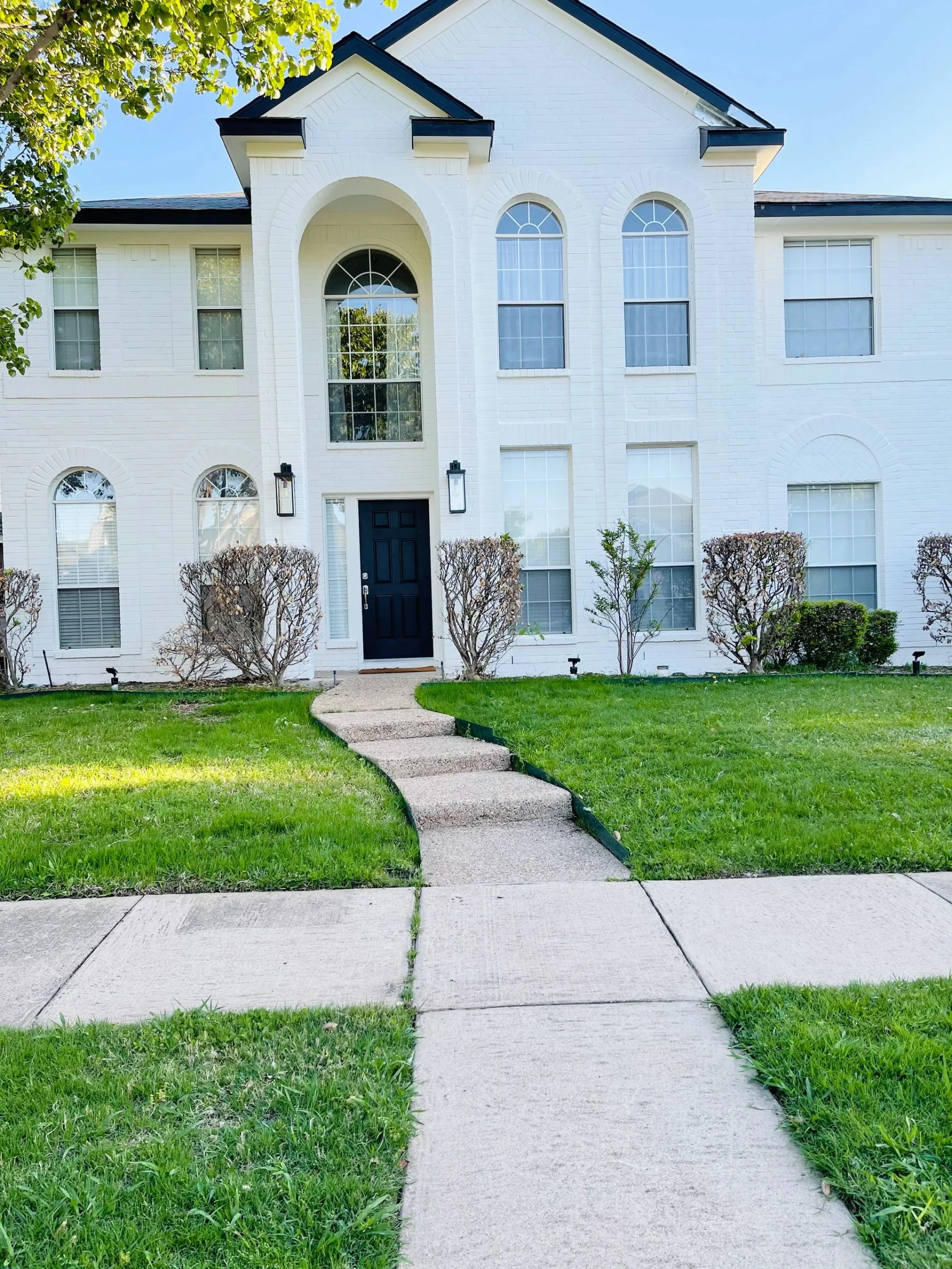 Painted brick exterior and entry